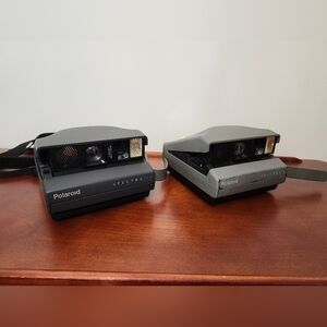 2 Polaroid Spectra Cameras